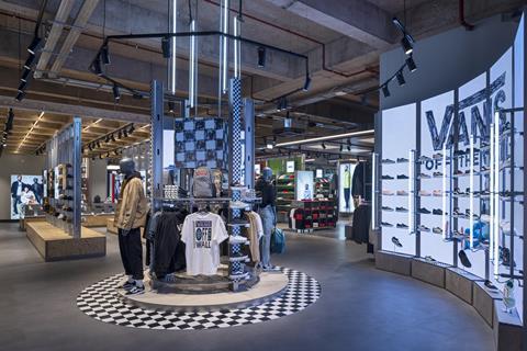 Interior of Sports Direct Manchester store showing Vans footwear on display